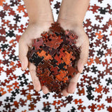 Hands holding puzzles pieces of Round 1000 piece Mars puzzle - planet puzzle space gift