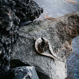 Genuine Meteorite necklace in the shape of a comet or shooting star
