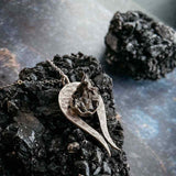 Genuine Meteorite necklace in the shape of a comet or shooting star