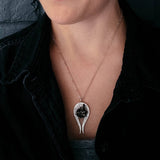 Genuine Meteorite necklace in the shape of a comet or shooting star