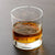 Outer space themed whiskey rocks glass showing northern summer night sky zodiac constellations