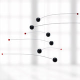 Futura mobile by danish Flensted Mobiles. Looks like moons and planets in space.
