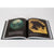 A book of cool photos of space from NASA, open to a real photo of Titan.