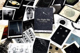 The Night Sky vintage outer space postcard set by Princeton Architectural Press, showing postcards of an astronaut space suit, planet Saturn, diagrams, space art, and more!