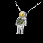Sterling Silver astronaut pendant necklace with green moldavite glass and gold enamel helmet visor - the perfect space jewelry gift!