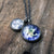 A layered space necklace featuring two pendants with the Earth and Moon under glass. A great Earth gift or Moon gift for a space lover!