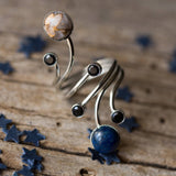 Space themed statement ring depicting planet Earth and our Moon orbiting through space- a beautiful space jewelry gift!