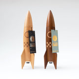 A large wooden rocket ship shaped salt/pepper grinder! A fun space gift for an adult space enthusiast.