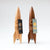 A large wooden rocket ship shaped salt/pepper grinder! A fun space gift for an adult space enthusiast.