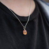 A sterling silver pendant space necklace with genuine Martian Mars meteorite dust inside! Space jewelry at its finest.
