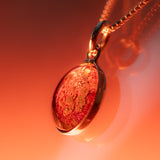 A sterling silver pendant space necklace with genuine Martian Mars meteorite dust inside! Space jewelry at its finest.
