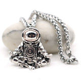Astronaut necklace showing a spaceman meditating. The perfect space gift!
