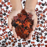 Hands holding puzzles pieces of Round 1000 piece Mars puzzle - planet puzzle space gift 