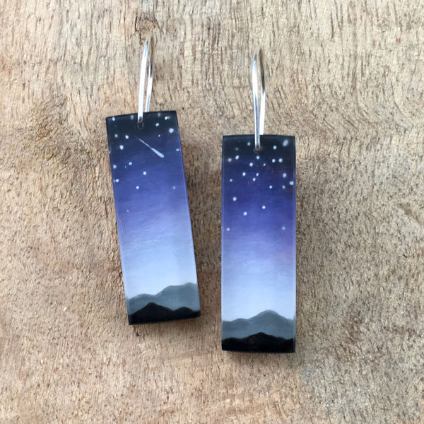 Space jewelry earrings hand-painted resin with starry night sky and mountains.