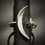 A sterling silver adjustable ring with a crescent moon and star - an elegant space jewelry gift