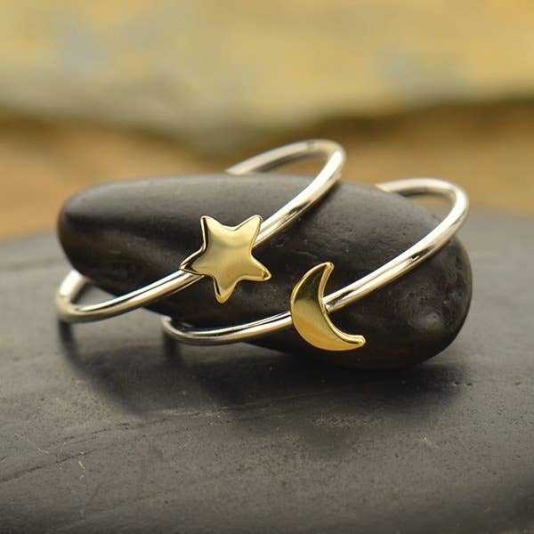 A sterling silver ring set with a bronze moon and star - the perfect dainty space rings jewelry gift!