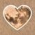 A vinyl heart moon sticker, perfect for any lover of the moon or space!