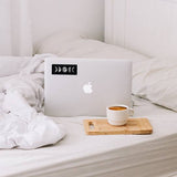 A vinyl moon phase sticker shown on a laptop, perfect for any lover of the moon or space!