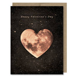 Space-themed Happy Valentine's Day card showing a pink, heart-shaped moon in space! Vintage style.