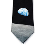 Front view of men's black space tie showing Earthrise view of earth and lunar surface from space, taken by NASA Apollo astronauts.