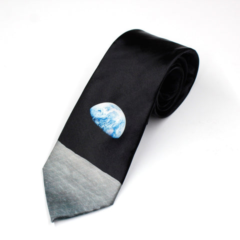 Men's black space tie showing Earthrise view of earth and lunar surface from space, taken by NASA Apollo astronauts.