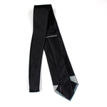Back view of black space tie showing Earthrise view of earth and lunar surface from space, taken by NASA Apollo astronauts.