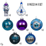 Set of 8 glass space themed Christmas ornaments including an astronaut ornament, space shuttle  rocket ornament, and UFO ornament
