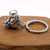 Astronaut key chain of a spaceman meditating. The perfect space gift!