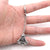 Astronaut key chain of a spaceman meditating. The perfect space gift!