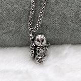 Astronaut pendant showing a spaceman meditating. The perfect space gift!
