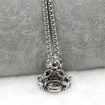 Astronaut pendant showing a spaceman meditating. The perfect space gift!