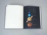 Inside lined space notebook page of Princeton Architectural Press Observer's Notebook: Astronomy, with diagram showing the sizes of the planets of our solar system.