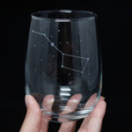 Hand holding an etched stemless wine glass with the Big Dipper constellation, space themed