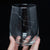 Hand holding an etched stemless wine glass with the Big Dipper constellation, space themed