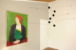 Futura mobile by danish Flensted Mobiles. Looks like moons and planets in space.