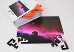 A space themed puzzle with geometric wood pieces showing the Horsehead Nebula galaxy. A great gift!