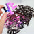 A space themed puzzle with geometric wood pieces showing the Horsehead Nebula galaxy. A great gift!