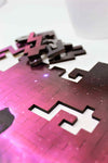 A space themed puzzle with geometric wood pieces showing the Horsehead Nebula galaxy. A great gift!