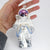 space themed glass astronaut ornament - side view