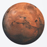 Round Mars Puzzle from Parkside Puzzles (formerly Four Point Puzzles) showing finished puzzle. A challenging space-themed puzzle and space gift!