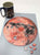 A uniqe round Mars puzzle made from wood, with oddly shaped pieces including special pieces an alien, Curiosity Rover, a spaceship and more! A round space-themed planet puzzle gift.