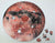 A uniqe round Mars puzzle made from wood, with oddly shaped pieces including special pieces an alien, Curiosity Rover, a spaceship and more! A round space-themed planet puzzle gift.