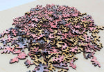 A uniqe round Mars puzzle made from wood, with oddly shaped pieces including special pieces an alien, Curiosity Rover, a spaceship and more! A round space-themed planet puzzle gift.
