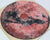 A uniqe round Mars puzzle made from wood, with oddly shaped pieces including special pieces an alien, Curiosity Rover, a spaceship and more! A round space-themed planet puzzle gift.