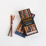 A colored pencil set featuring real photos of Mars from NASA. Shown with the box open.