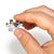 Hand holding Mars colony puzzle piece
