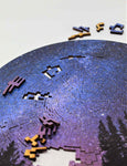 A beautiful space themed puzzle of Milky Way Galaxy at night. Made of wood. Bewilderness brand.