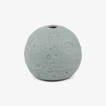 A silicone moon ice ball mold to make moon shaped whiskey ice balls!
