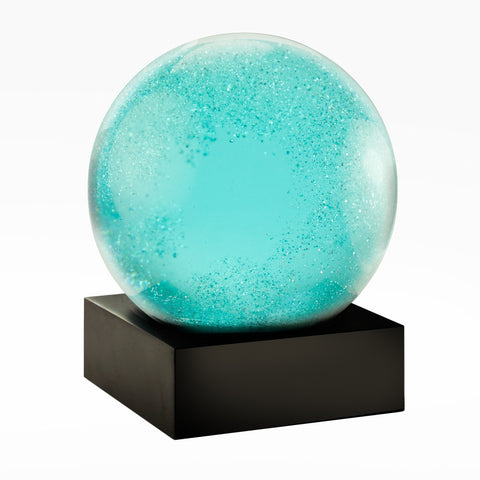Moonlight snow globe made of glass with glittery blue snow inside that looks like moon light and stars! A gift for space lovers!