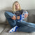 Woman wearing NASA space slippers with NASA logo, space gift idea